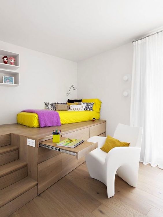 A genius idea for a small kids' bedroom   built in storage units and even a desk to hide when not in need