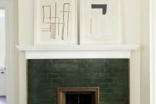 22 accent your small fireplace with dark green tiles and abstract artworks on the mantel if your home is mid-century modern or contemporary