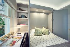 24 a home office with a hidden Murphy bed behind the doors lets the space double as a bedroom and home office