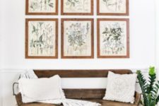 26 tropical leaves in a vase, baskets for storage and vintage botanical posters as artworks for a summer feel