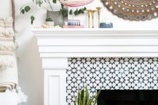 a lovely built-in fireplace with tiles