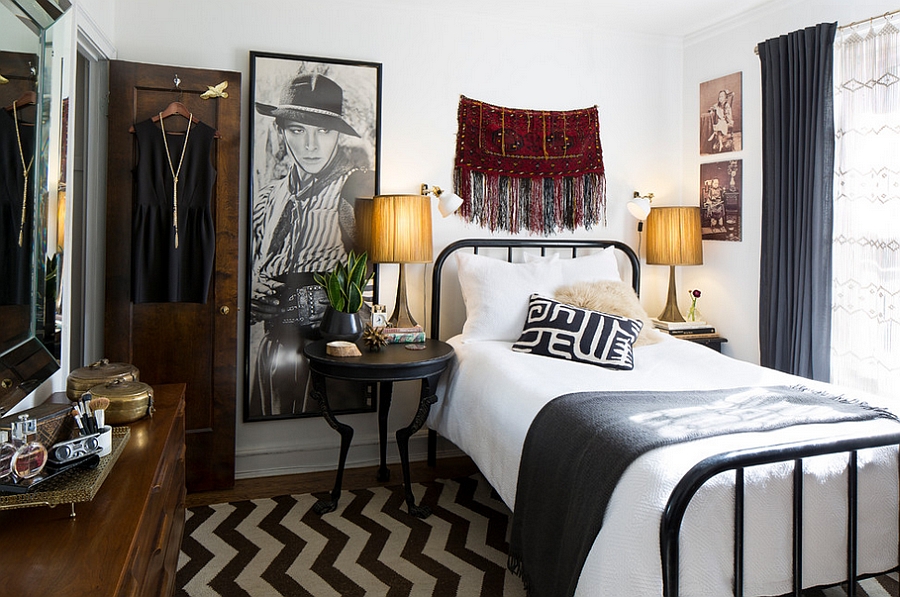 A small eclectic bedroom mixing up boho and mid century modern decor and with an elegant mix of black and white