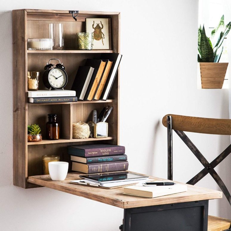 a stylish rustic Murphy desk of stained wood with a black top features also a shelf for storage, not just a desktop itself