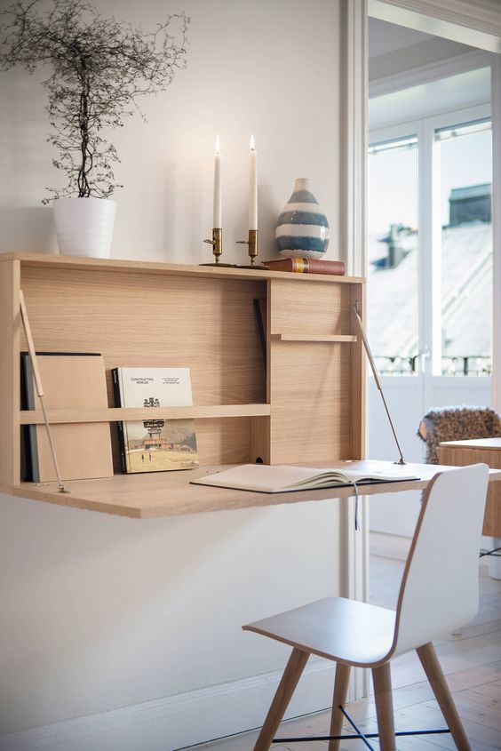 an elegant contemporary Murphy desk  with some storage space and a comfy tabletop for a cozy working nook
