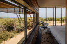09 The bedrooms feature amazing views of the surroundings and are decorated in a simple and laconic way
