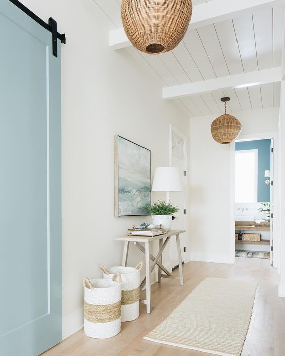 wicker pendant lamps finish off a beach hallway and make it more chic and cool