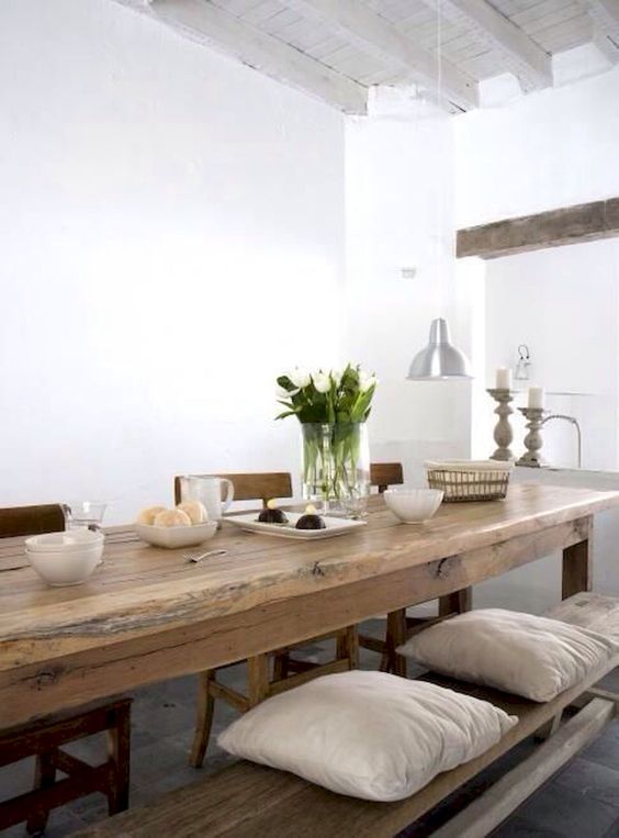 a rustic dining table is long and can accommodate a lot of guests, a long bench will let them all sit comfortably