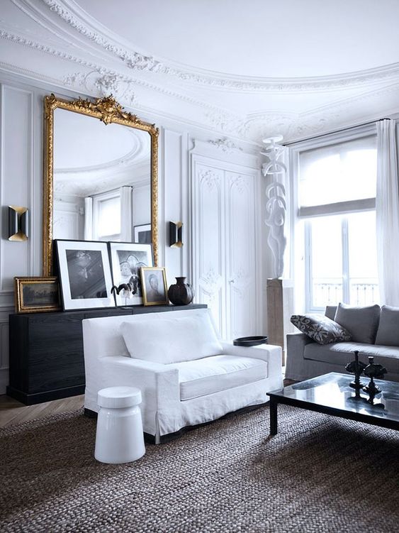 gorgeous molding on the walls and ceiling is right what you need to make your living room truly Parisian