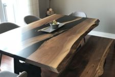 15 a sleek wooden dining table with black touches and a live edge plus a matching bench for a contemporary feel