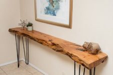 15 a very sleek and narrow entryway console table with a live edge and hairpin legs is a great way to fill in the space