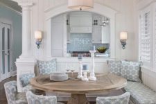17 a rustic round table and patterned chairs and a bench for a cozy rustic dining space with a beachy feel