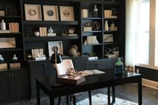 19 a black home office with a built-in wall unit and a polished desk is refreshed with some neutral touches