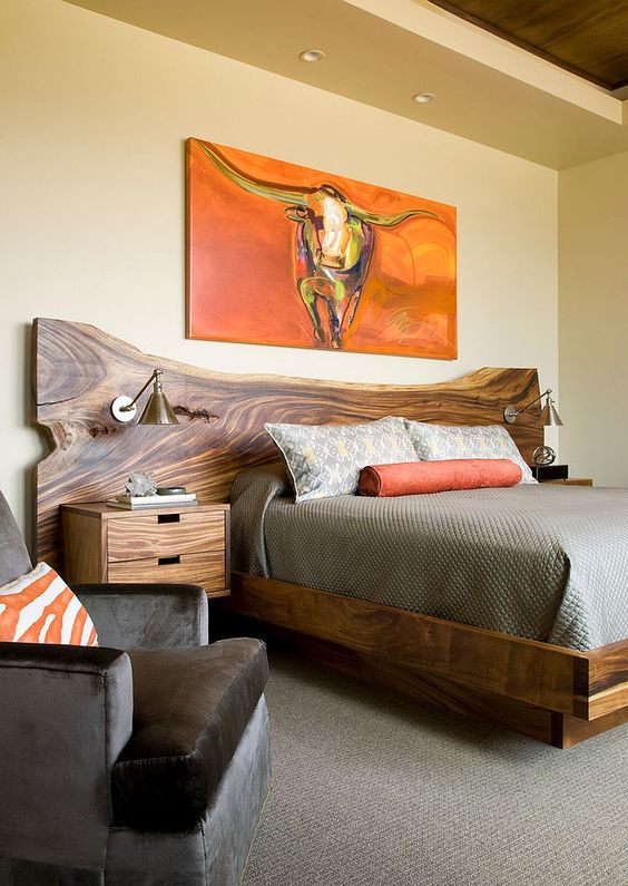 a rich stained live edge wooden bed with matchingnightstands for a rustic bedroom