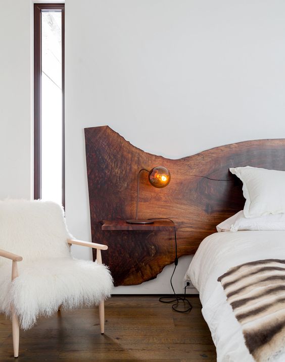 if your bed doesn't have a headboard, you can make a separate one with a live edge