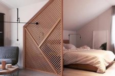 22 a stylish attic wooden screen with a geometric pattern will subtly divide the spaces