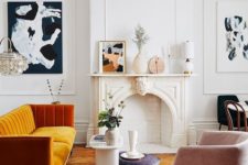 23 a more contemporary version of a fireplace matches the mid-century modern Parisian living room