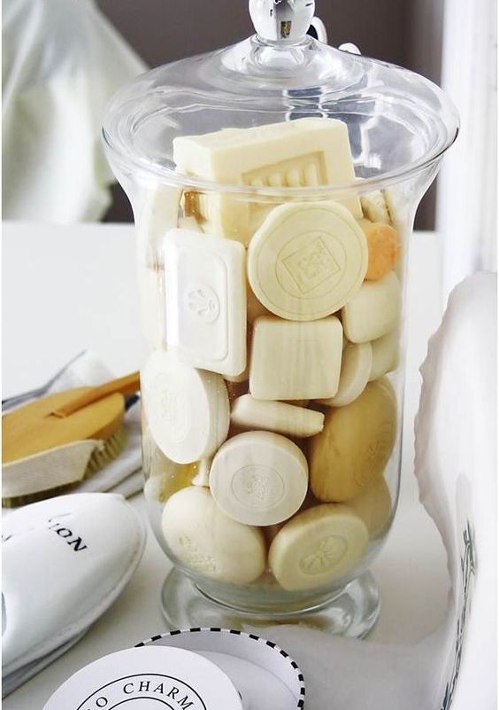 a stylish glass jar with various soaps will instantly raise the level of chic in your bathroom