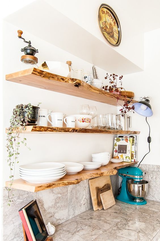live edge floating shelves look very chic and will perfectly refresh and enliven your kitchen