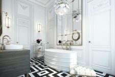 a super chic and elegant monochromatic bathroom with a patterned floor, a statement chandelier, a large mirror, a sculptural tub and gilded touches
