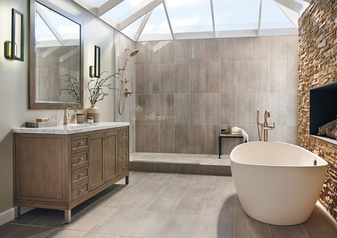 Wood imitating tiles, faux stone, a vintagw wooden vanity with a stone countertop and a contemporary bathtub for a gorgeous transitional space