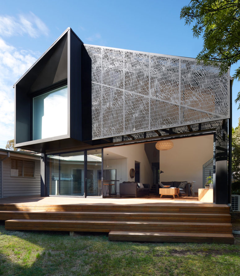 Contemporary House Addition With A Screened Facade
