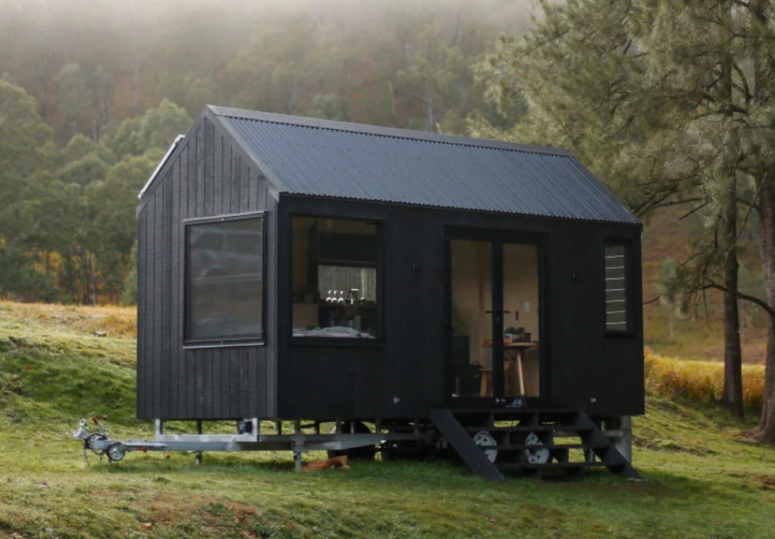 This tiny off grid cabin is great for outdoor living, it's sure to make your summer getaway super sustainable