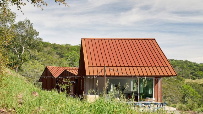 Triple Barn residence is a unique home, which consists of three volumes under gabled roofs that are connected to each other