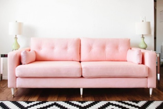 A chic mid century modern hack of an IKEA Karlstad sofa in pink will brighten up your space