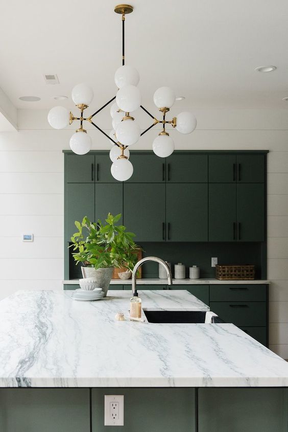 a statement mid-century modern bubble chandelier is a cool idea to add timeless elegance and much light to the kitchen