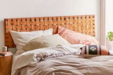 03 a woven leather headboard in a pretty bold amber shade is ideal for a boho or woodland bedroom