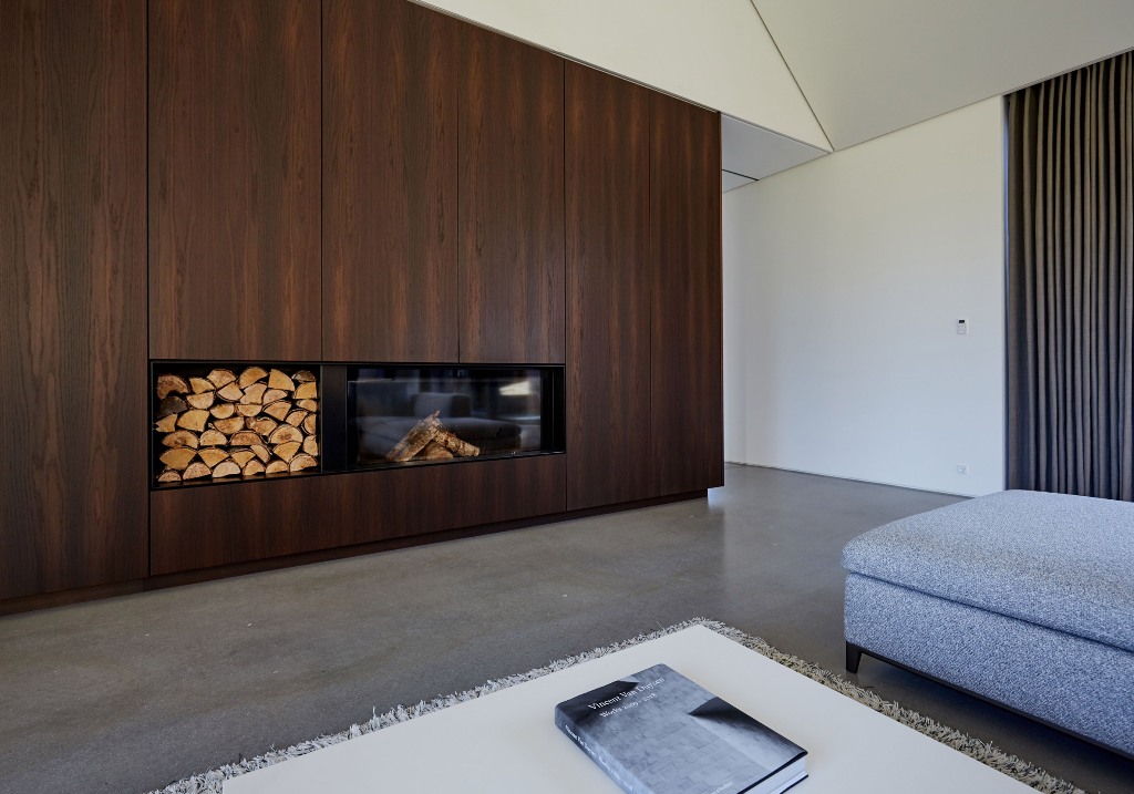 The appliances are built in, and so is the fireplace, the floors are concrete