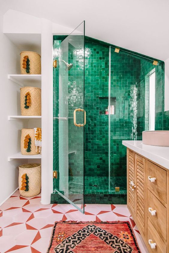 a boho attic bathroom with an emerald tile shower space that really stands out