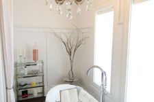 04 a refined and elegant crystal chandelier will make your bathroom super beautiful and stunning
