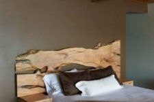 05 a live edge wooden headboard with little floating nightstands adds a natural feel to the space