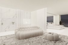 06 There’s a lounge here, a sleek white marble kitchen and the spaces can be separated with a space divider for privacy