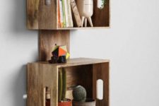 06 a stylish crate shelving unit of a wooden plank and crates will work for a rustic or mid-century modern space