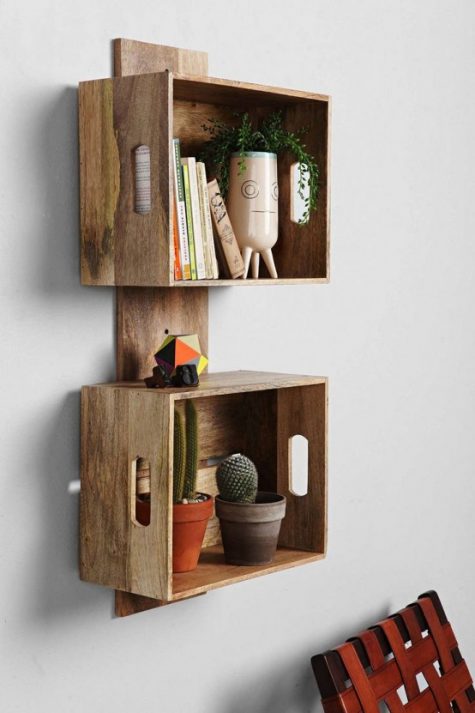 a stylish crate shelving unit of a wooden plank and crates will work for a rustic or mid-century modern space