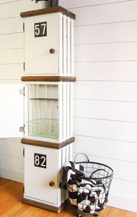 elegant white crate lockers with numbers are a chic and cool DIY for any laundry or mudroom