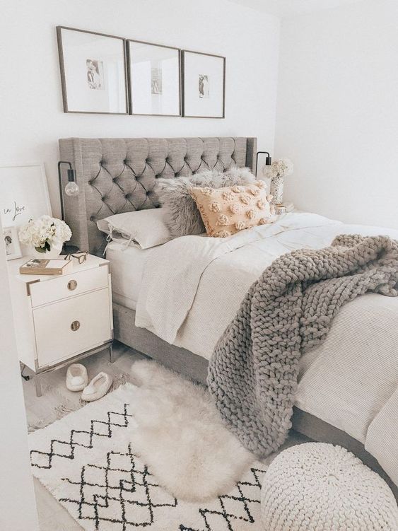 a grey wingback tufted headboard is a stylish and timeless idea that will fit a contemporary bedroom