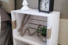 09 a white crate shelving unit on casters highlighted with yarn is a stylish idea with a rustic feel