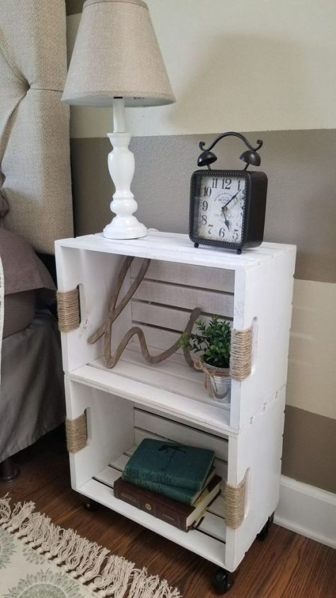 a white crate shelving unit on casters highlighted with yarn is a stylish idea with a rustic feel