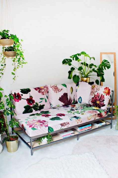 an IKEA Ekebol couch hack with bright floral print fabric is an amazing idea for a summer living room