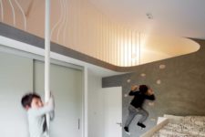 11 One kids’ room features a climbing wall and other activity items for fun