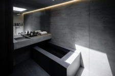 a super minimalist concrete bathroom design
