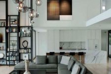 11 hanging glass pendant lamps at different height will make a bold statement and bring light