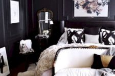 13 a chic bedroom with black paneled walls is brightened up with a white ceiling and creamy furniture and touches