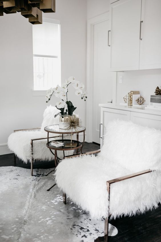 comfy chairs dressed up for the fall with white faux fur to make them cozier and softer