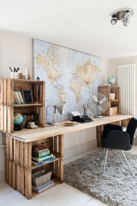 an oversized rustic desk made of crates and a long wooden plank tabletop is an easy DIY and its gives you much storage space