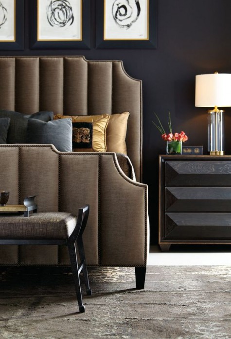 a brown velvet headboard with antique brass nailhead outlines and a pattern is a stylish idea for a modern space