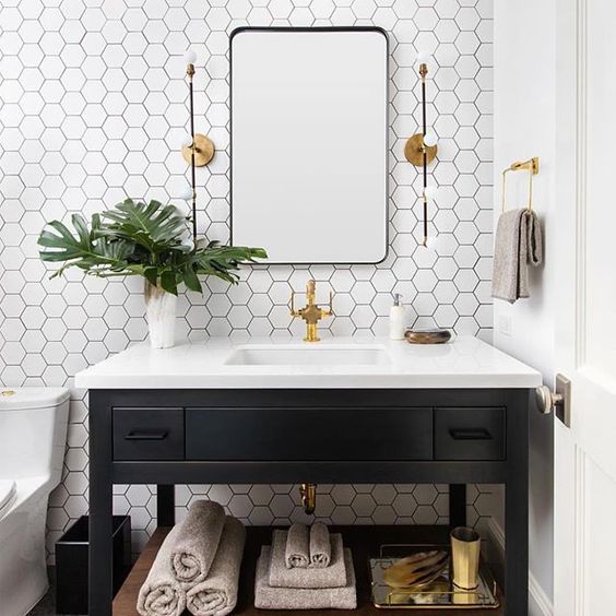 white hex tiles with black grout will make your black and white space non-boring